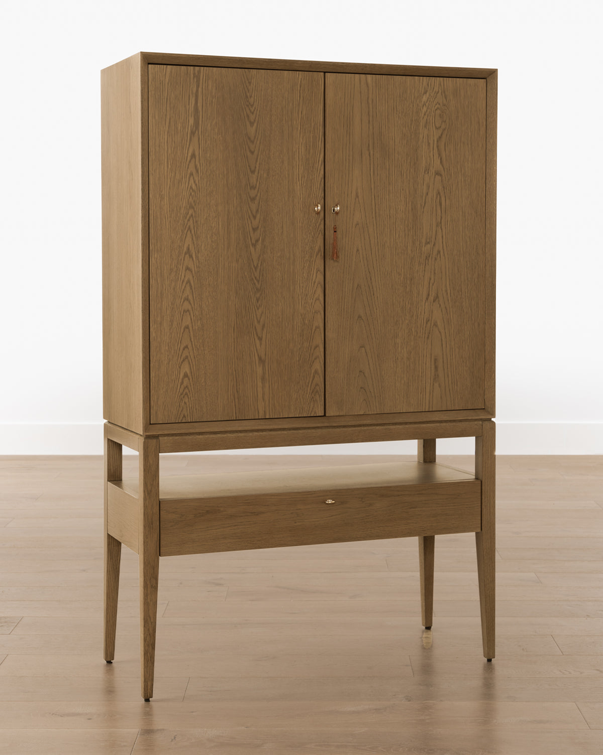 Rustic Honey Oak Cabinet with Ring Pulls & Beveled Edges for Living Room