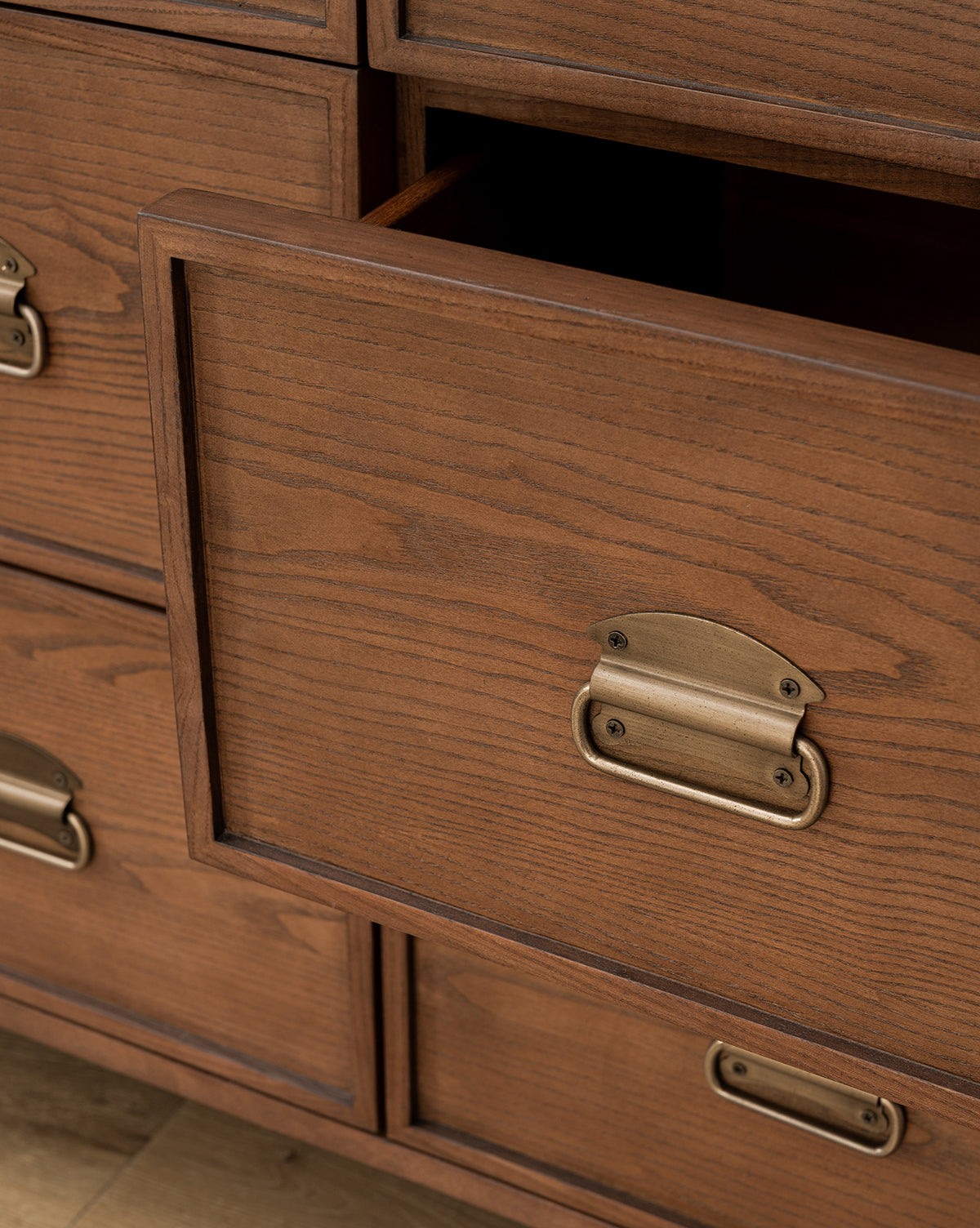 Modern Walnut Dresser with Curved Profile & Brass Accents for Bedroom