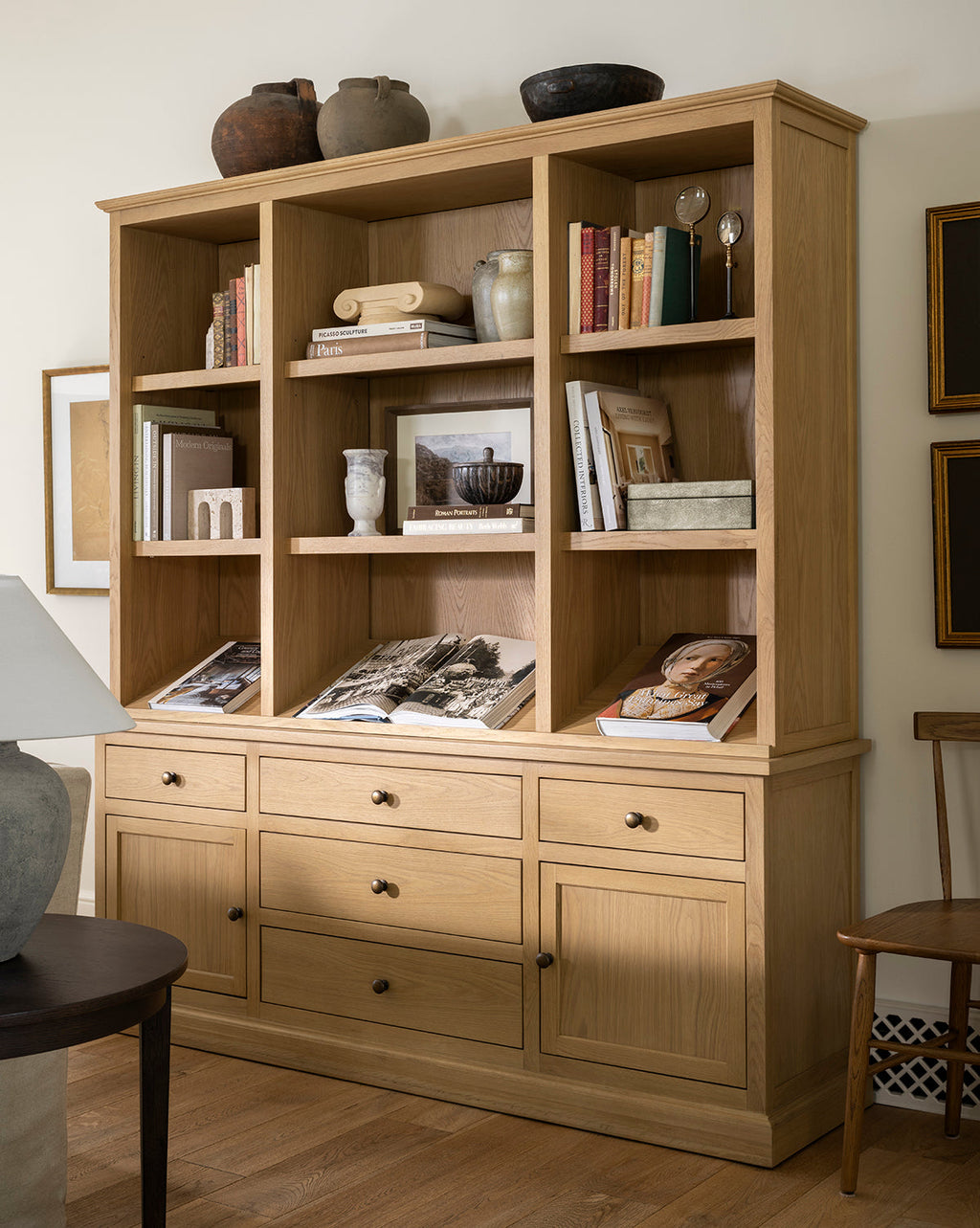 Traditional-Modern Oak Cabinet with Integrated Lighting & Angled Shelf for Living Room